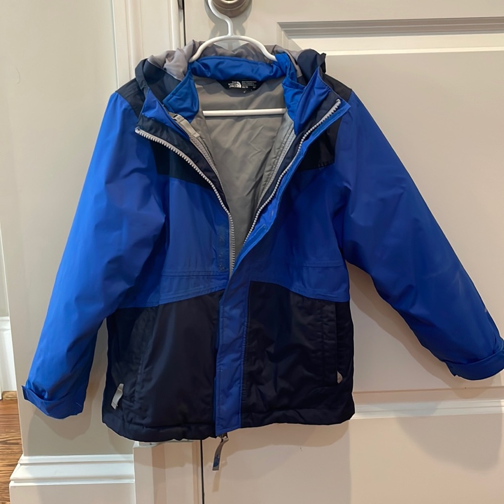 Kids size 6 North Face jacket with inner layer North Face jacket as well.